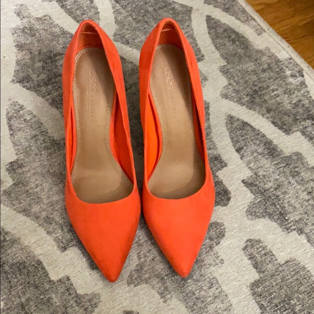 Orange pointy toe stilettos